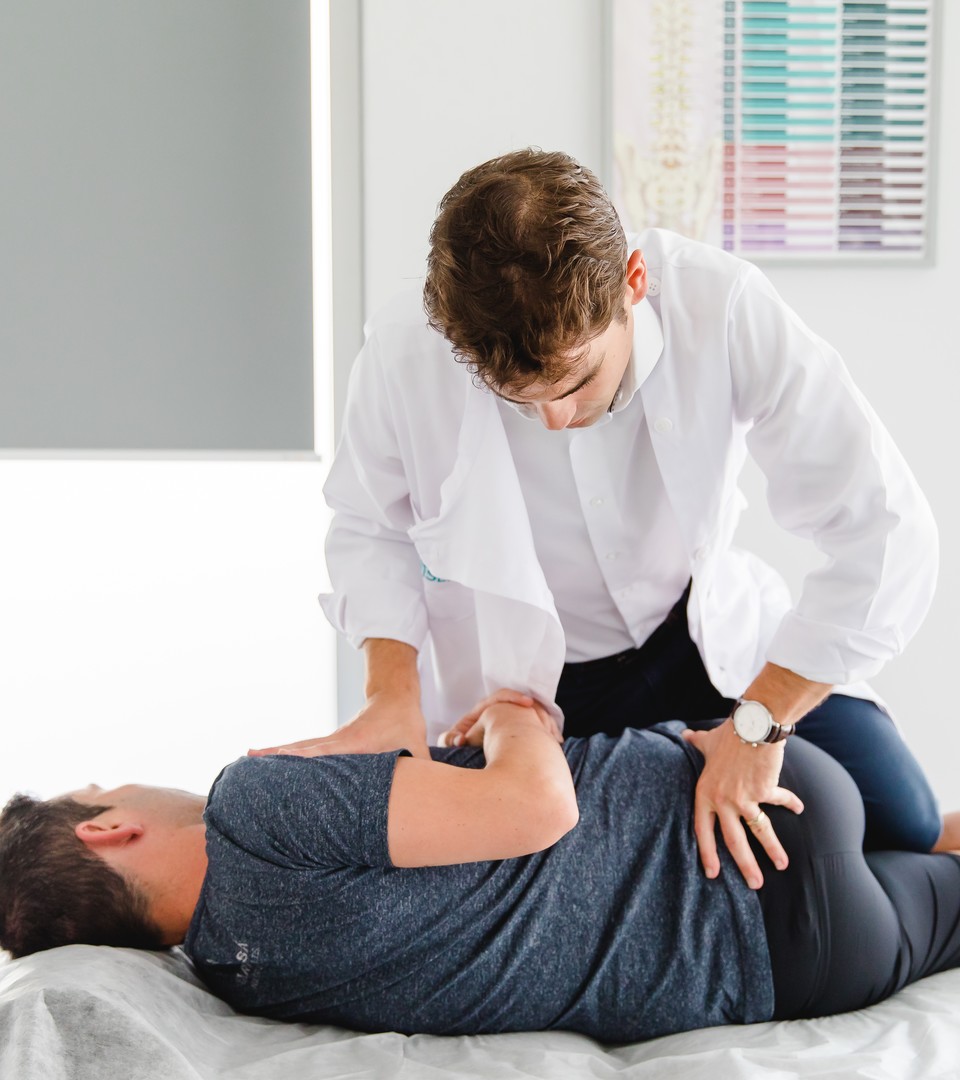 Osteopata com paciente